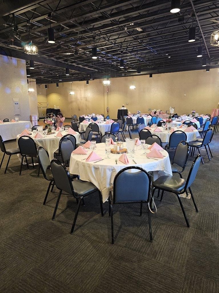The CG Event Center set with blush-pink napkins and place settings for a shower or celebration in Kennewick, WA