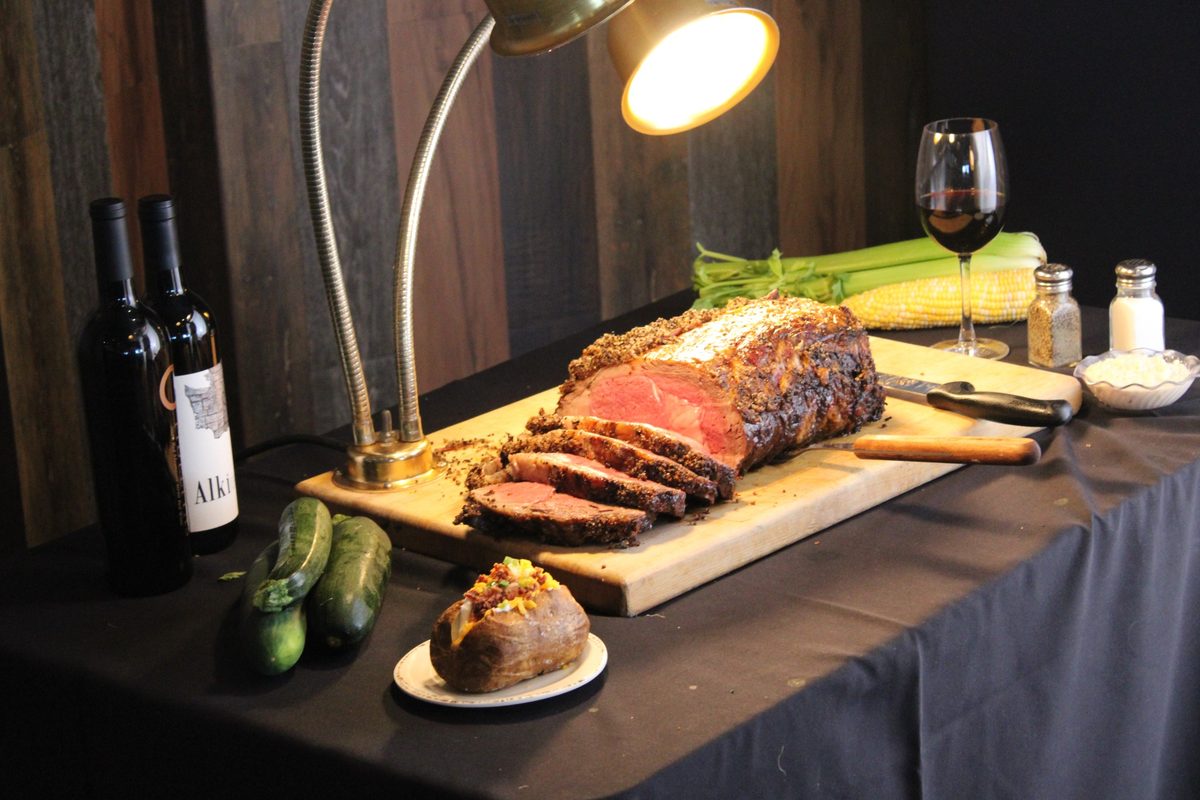 Slow-roasted, peppercorn-crusted prime rib carved and served with a loaded baked potato — every Friday and Saturday night